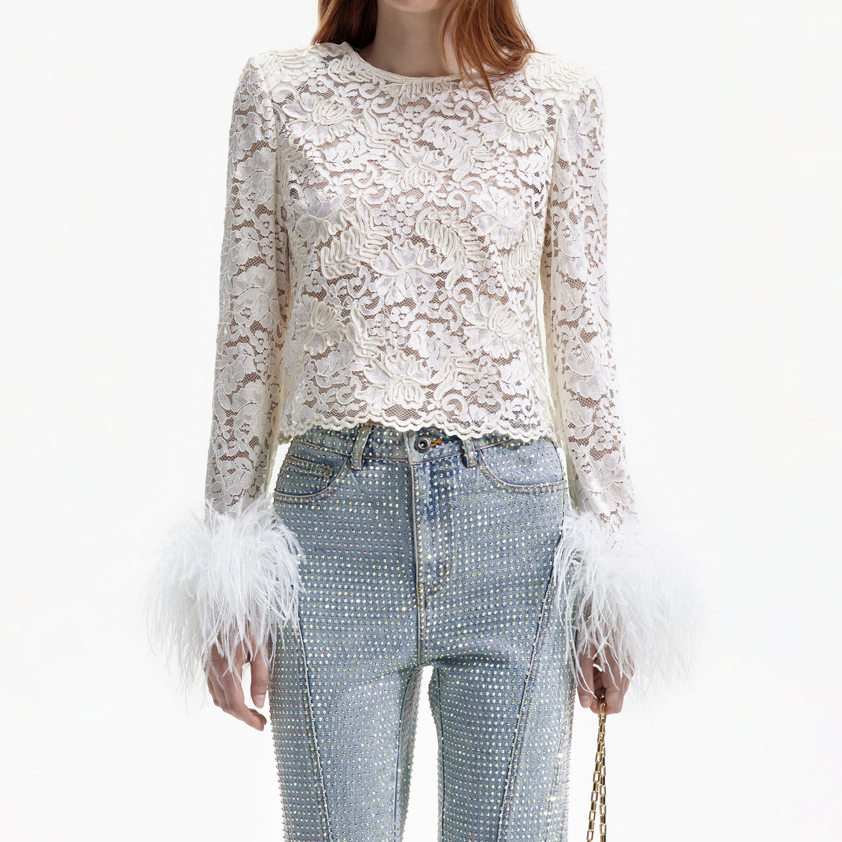 Cream cord lace long sleeved top with feather sleeves
