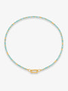 Necklace with blue beads and gold clasp on a white background