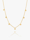 Gold necklace with bird-shaped pendants on a white background