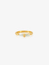 Gold ring with a white stone on a white background