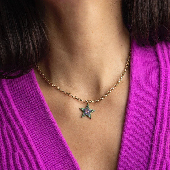 Gold chain necklace with star pendant featuring pave blue and pink sapphires and Tsavorite diamonds