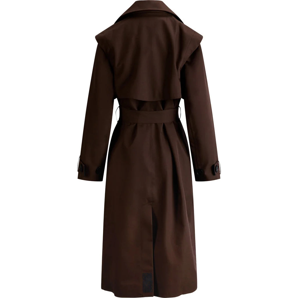 A dark brown trench coat shown from the back, featuring a wide collar, long sleeves, and a matching waist belt, set against a plain white background.
