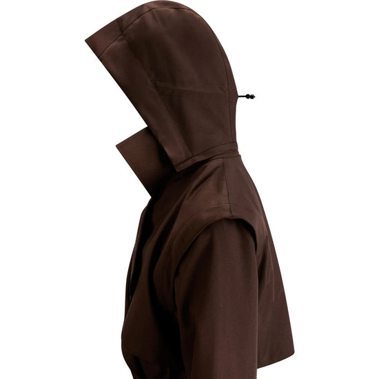 close up of hood of a brown trench coat on a white background