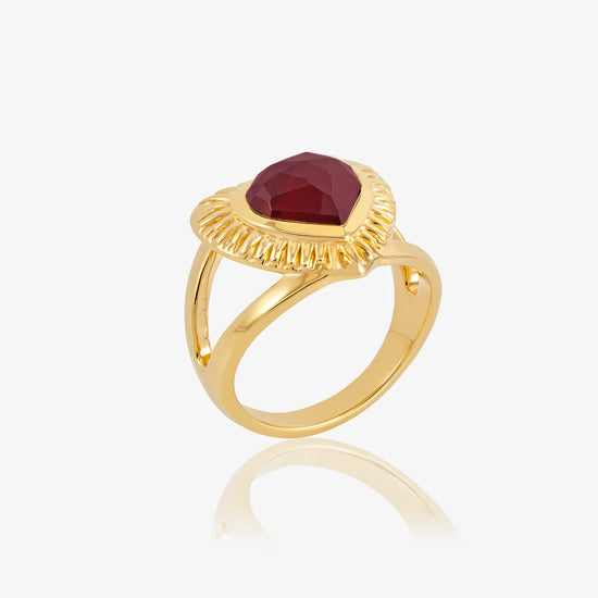 gold heart shaped adjustable ring  with red stone inside from rachel jackson model shot