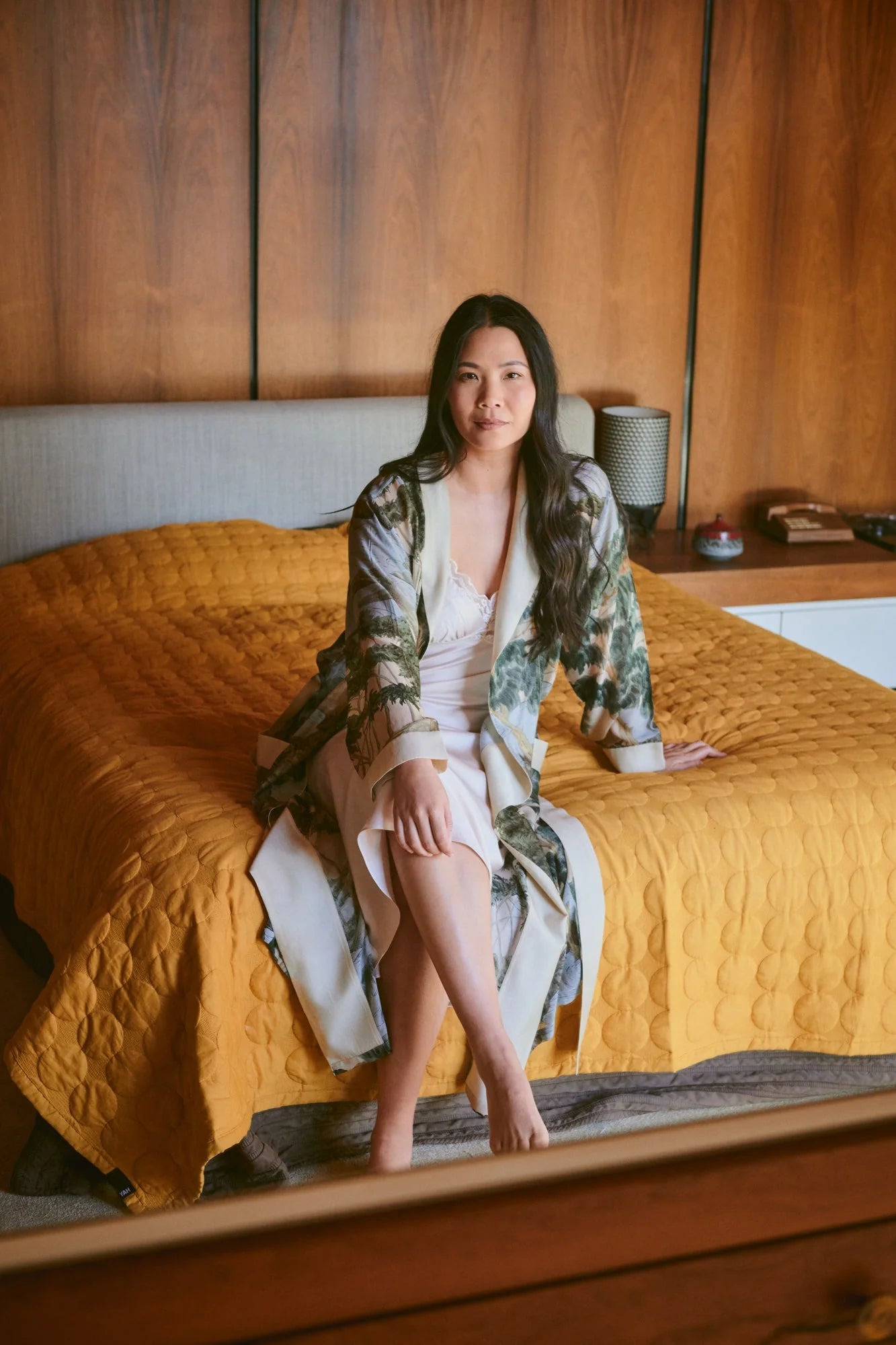 dressing gown with beige lapels/edging and green/blue tree and rivers print from one hundred stars model shot