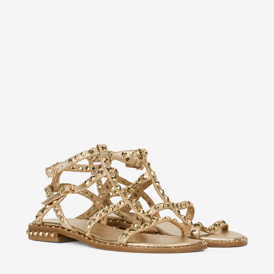 Gold sandal with gold studs on a white background alternate angle