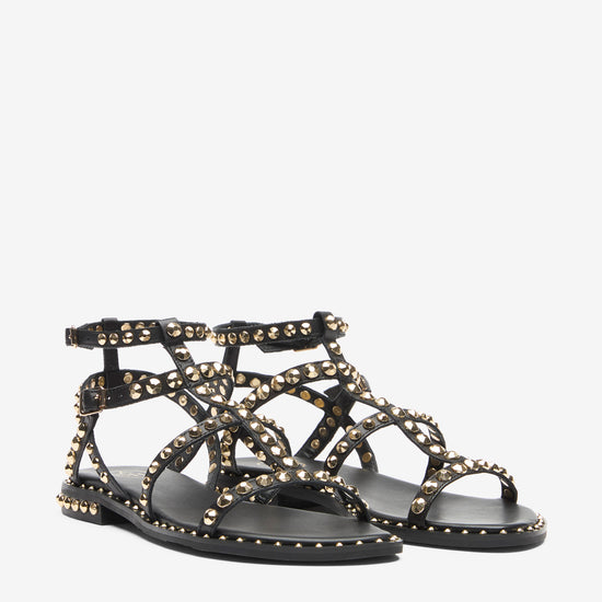 Black sandal with gold studs on a white background alternate view