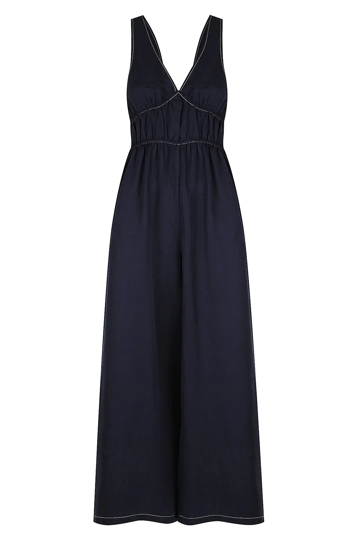 Navy wide leg jumpsuit with deep V neckline and thick tie straps at the back with white contrast stitching