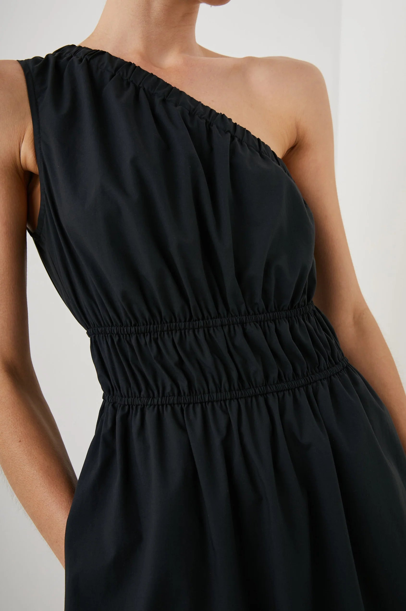 One shoulder black dress with side split and double elasticated waistband