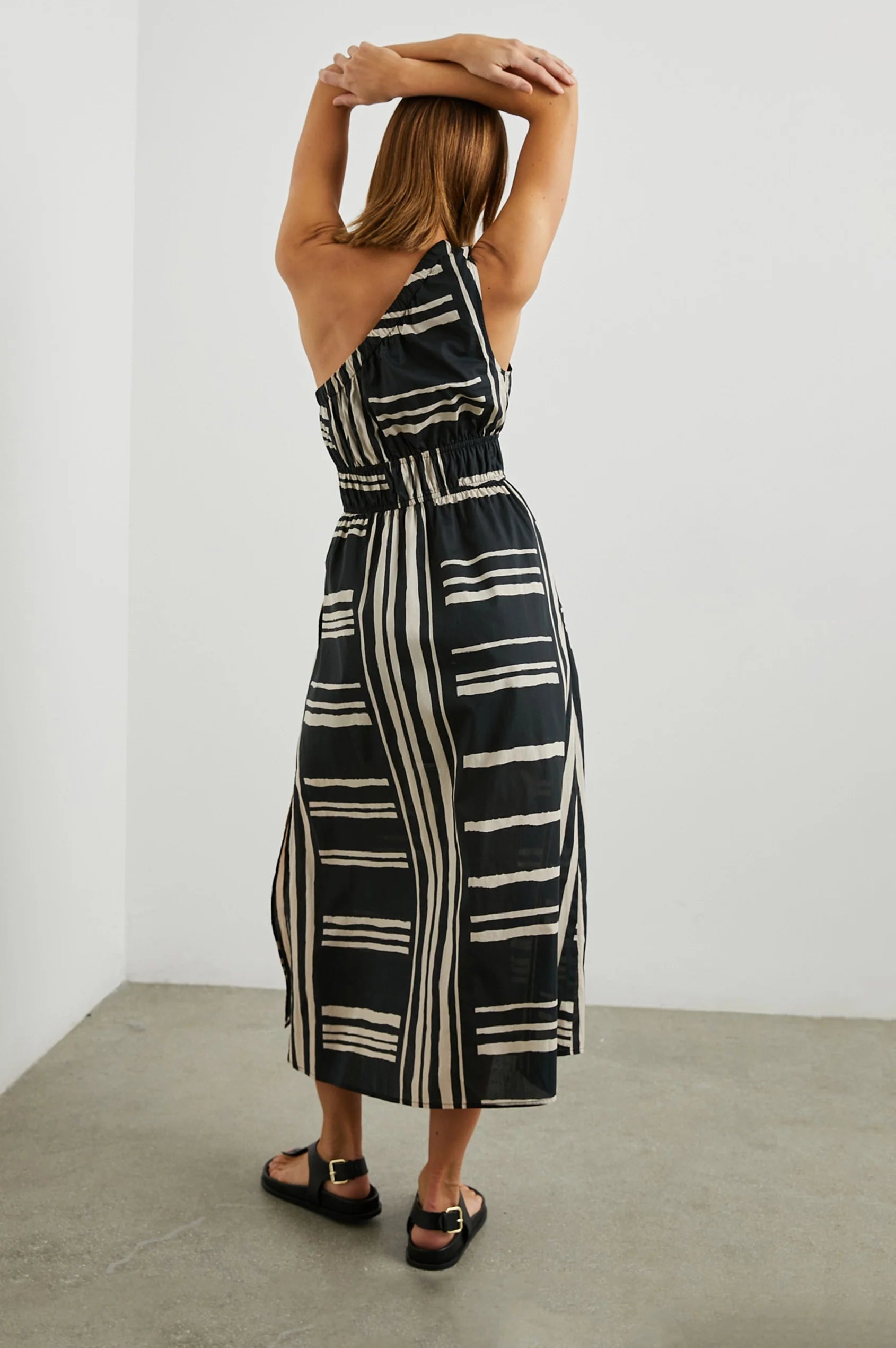 one shoulder dress with black and white stripe rear view