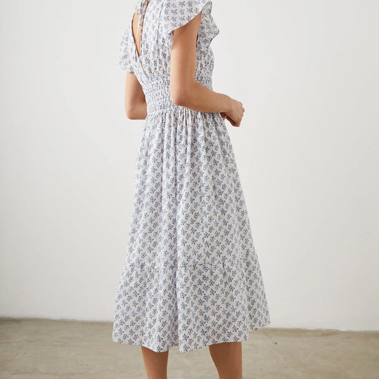 White and ditsy floral V neck and backline midi dress with capped frill sleeves and double tiered lined skirt