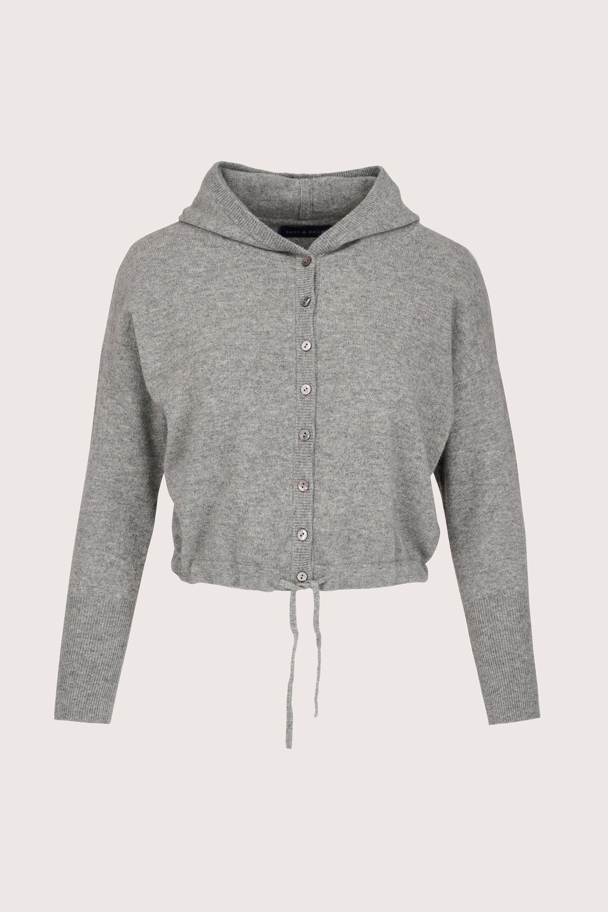A light gray heather cropped hoodie cardigan with a button-up front, long sleeves, and a drawstring hem, shown against a solid off-white background.