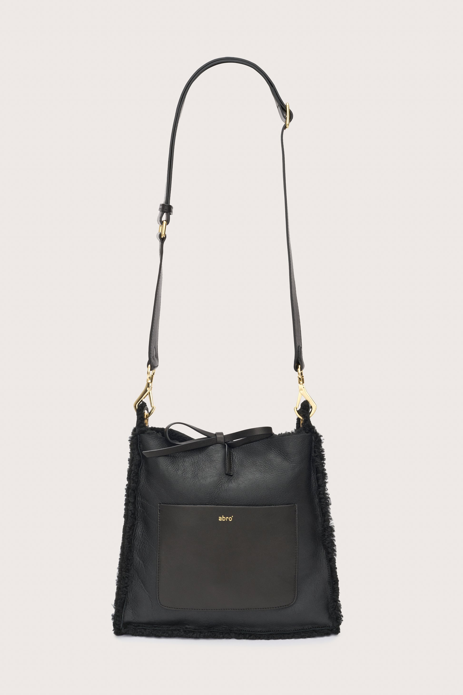 Black shearling reversible bag