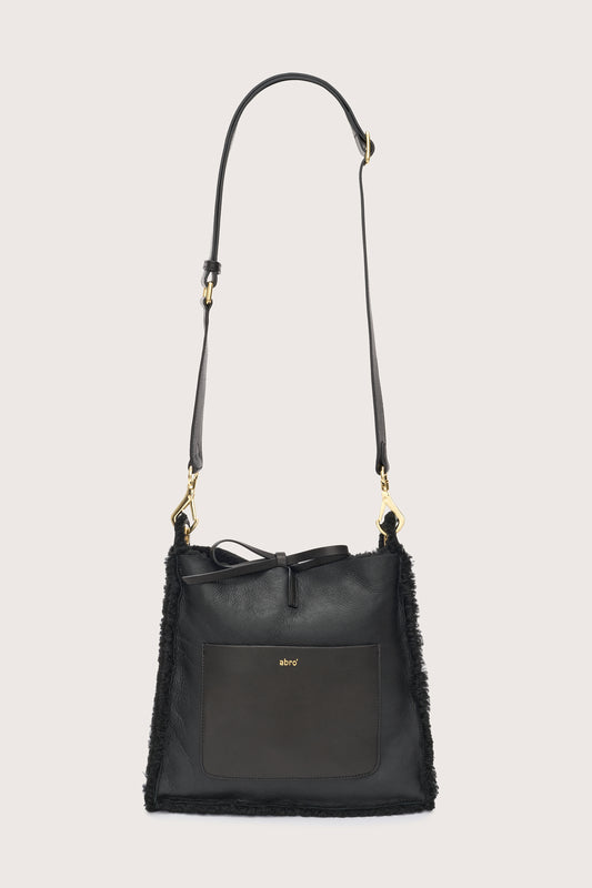 Black shearling reversible bag