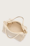 Internal shot of cream faux fur bag