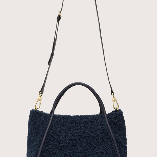 Faux shearling navy bag with cross body bag