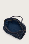 Internal shot of navy faux shearling bag