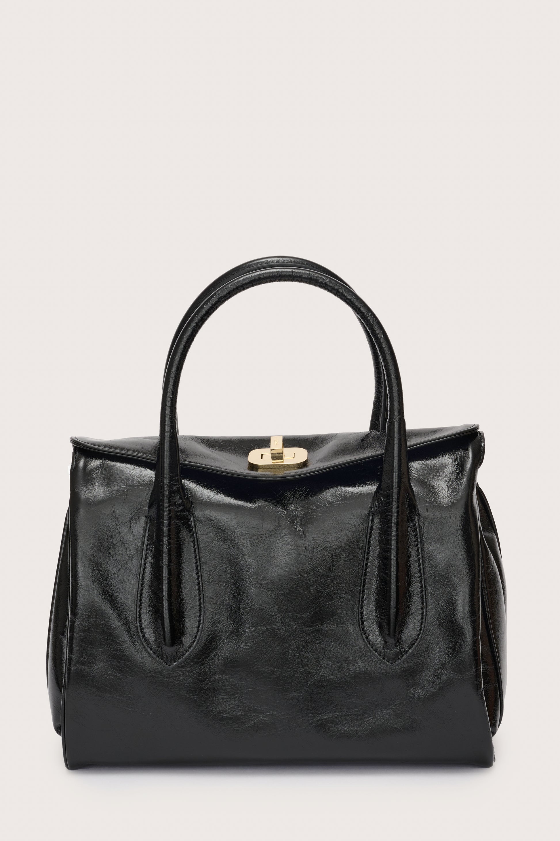 Black leather bag with gold fastening