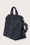 Reversible navy shearling bag with cross body strap