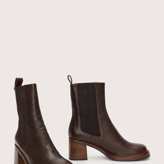 Side view of brown leather boot with block heel