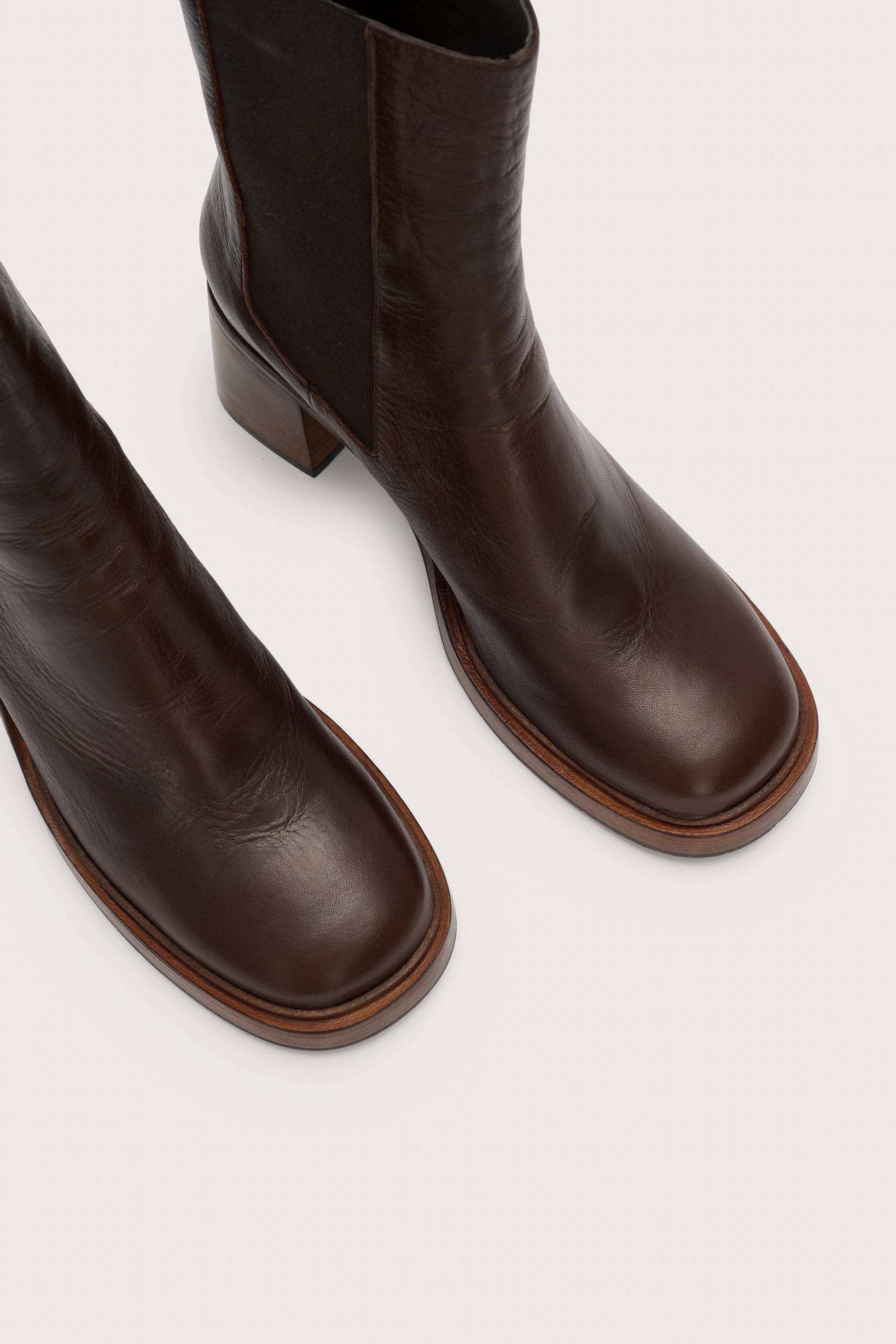 Shot of the toes of the brown leather pull on boot