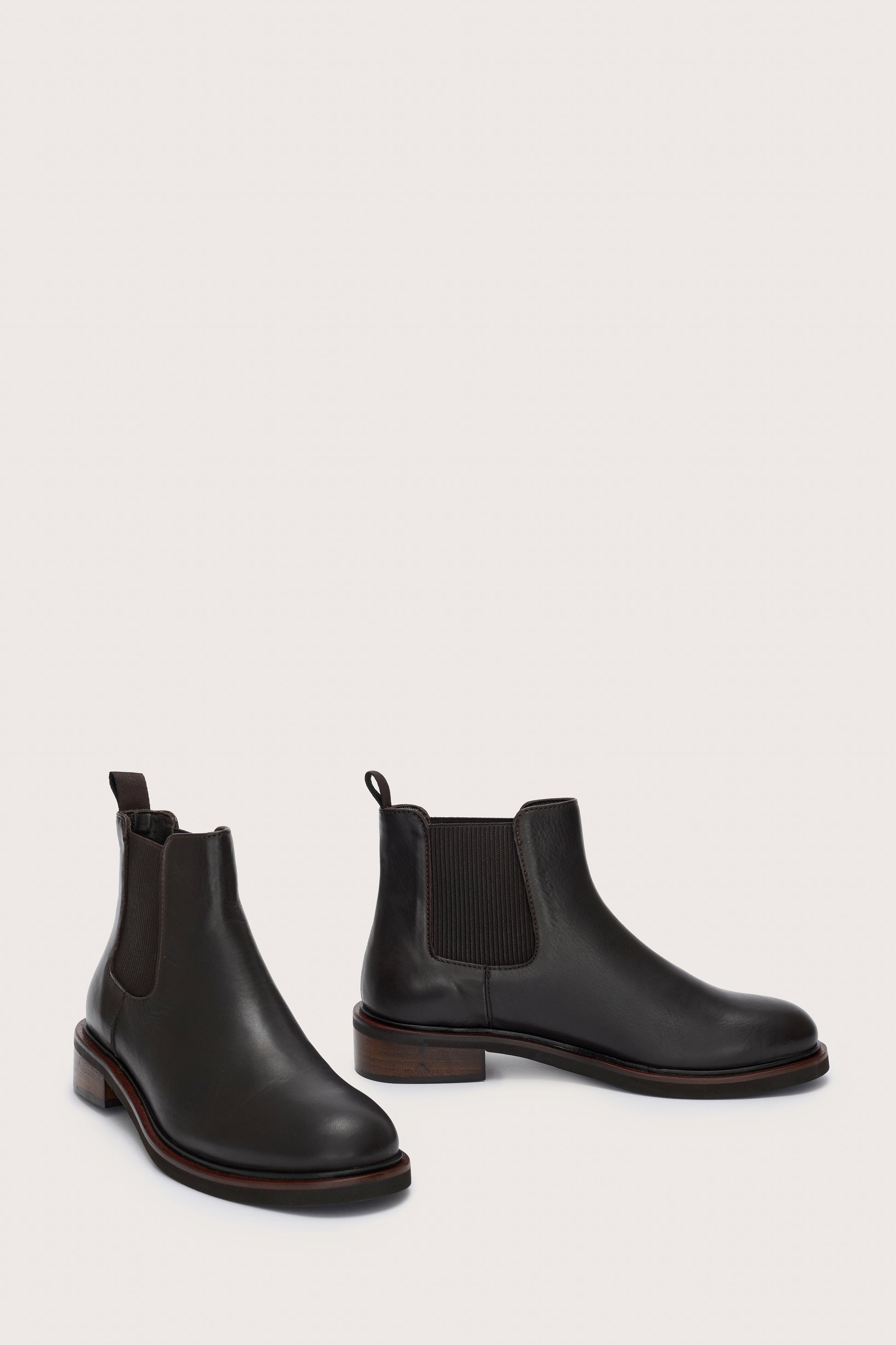 Side view of short black chelsea boot