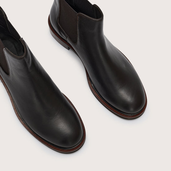 Toe close up of short chocolate brown chelsea boot