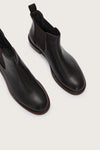 Toe close up of short chocolate brown chelsea boot