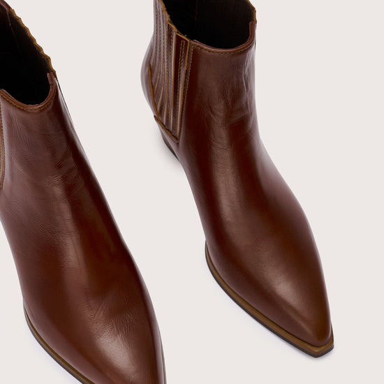 brown leather short cowboy boot birds eye view 