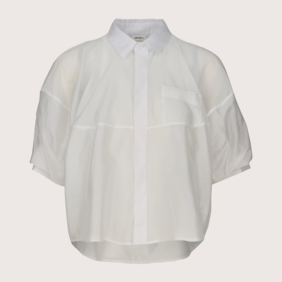 White sheer blouse on a light gray background