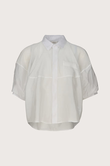 White sheer blouse on a light gray background