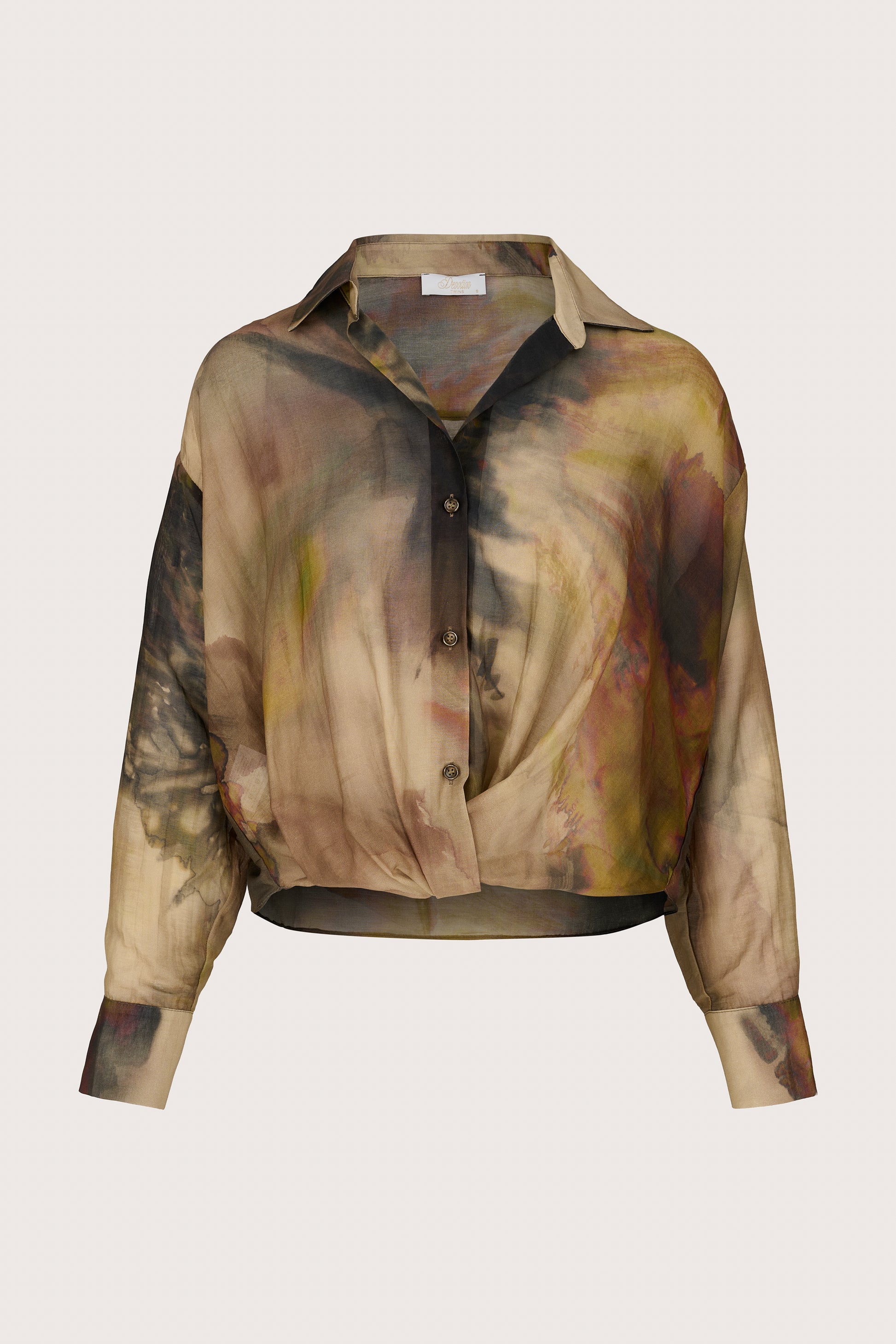 Artistic abstract patterned shirt on a light beige background