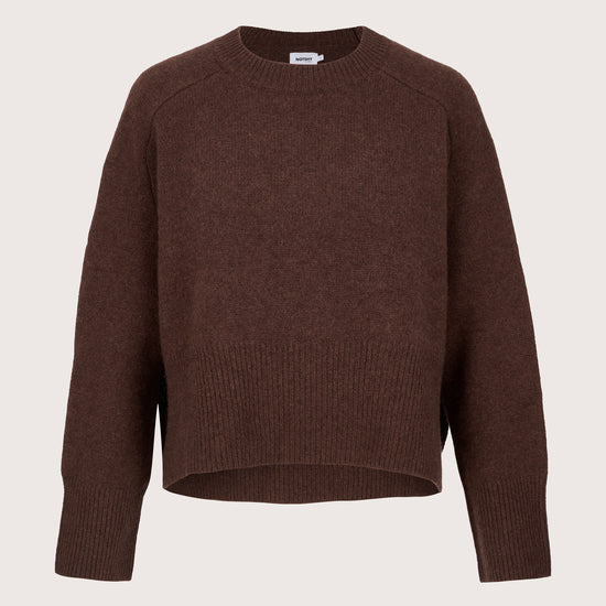 Cashmere Brown sweater on a beige background