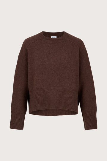 Cashmere Brown sweater on a beige background