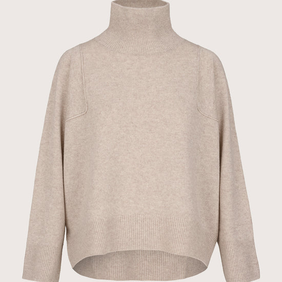 Beige sweater with a turtle neckline on a light beige background