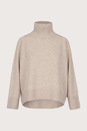 Beige sweater with a turtle neckline on a light beige background