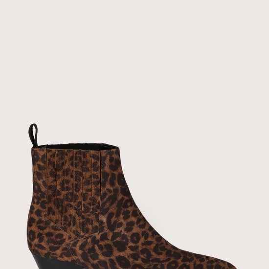 Leopard print ankle boot on a light gray background