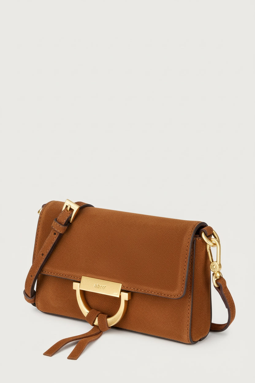 tan suede handbag with removable straps