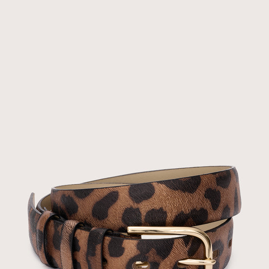 Leopard print belt with a gold buckle on a beige background