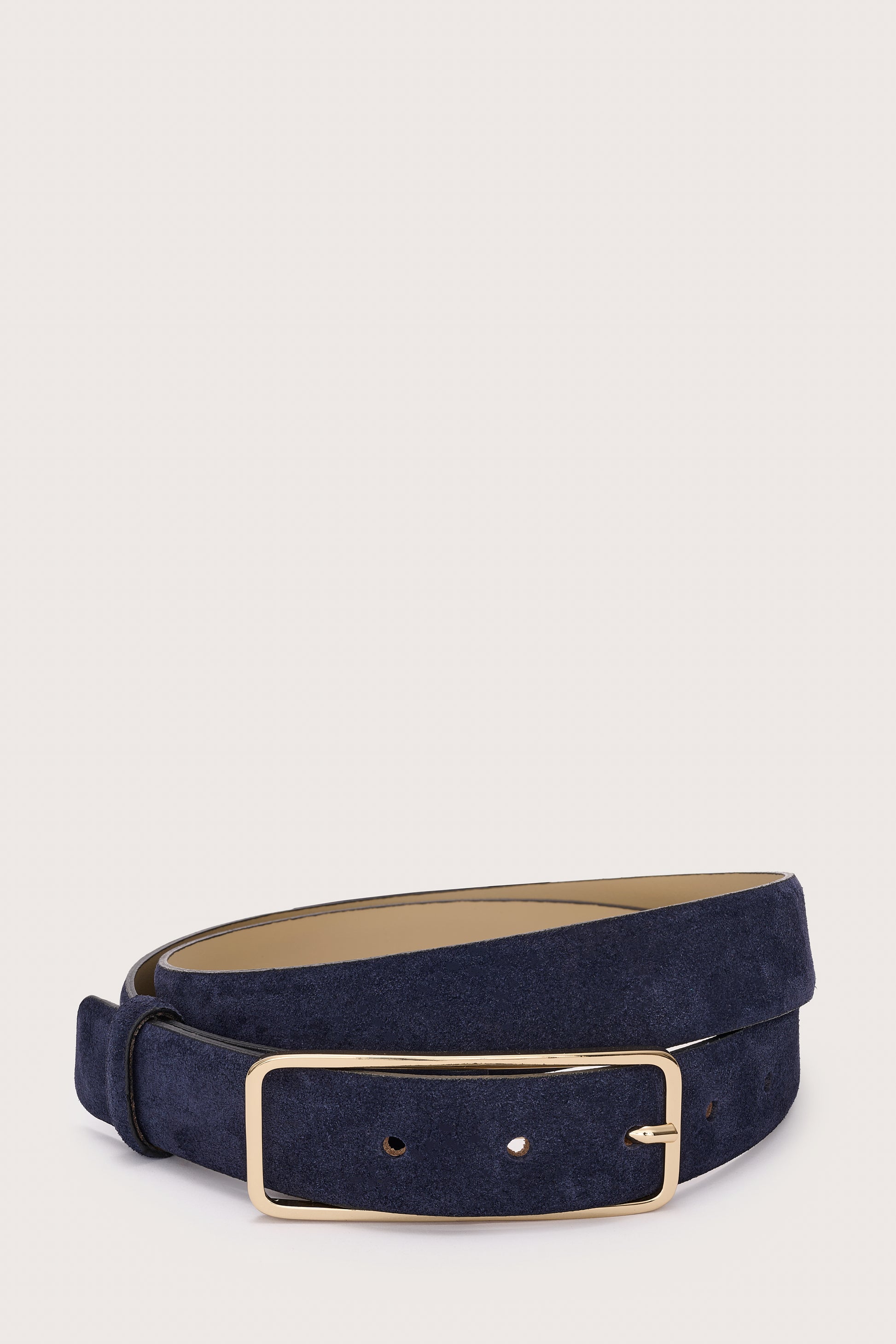 Navy belt with a gold buckle on a light gray background
