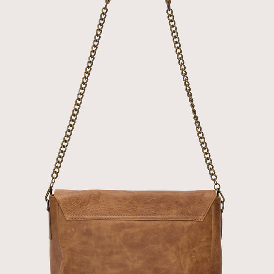 caramel leather flap bag with chain strap and panther stamp rear view