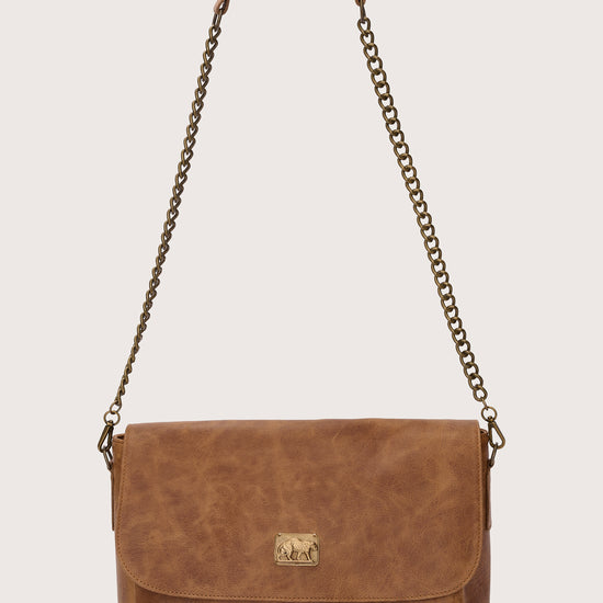 caramel leather flap bag with chain strap and panther stamp