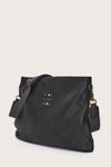 black leather bag with black linen strap and metal stamp detailing side view