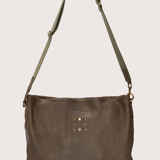 khaki green leather bag with khaki green linen strap and metal stamp detailing