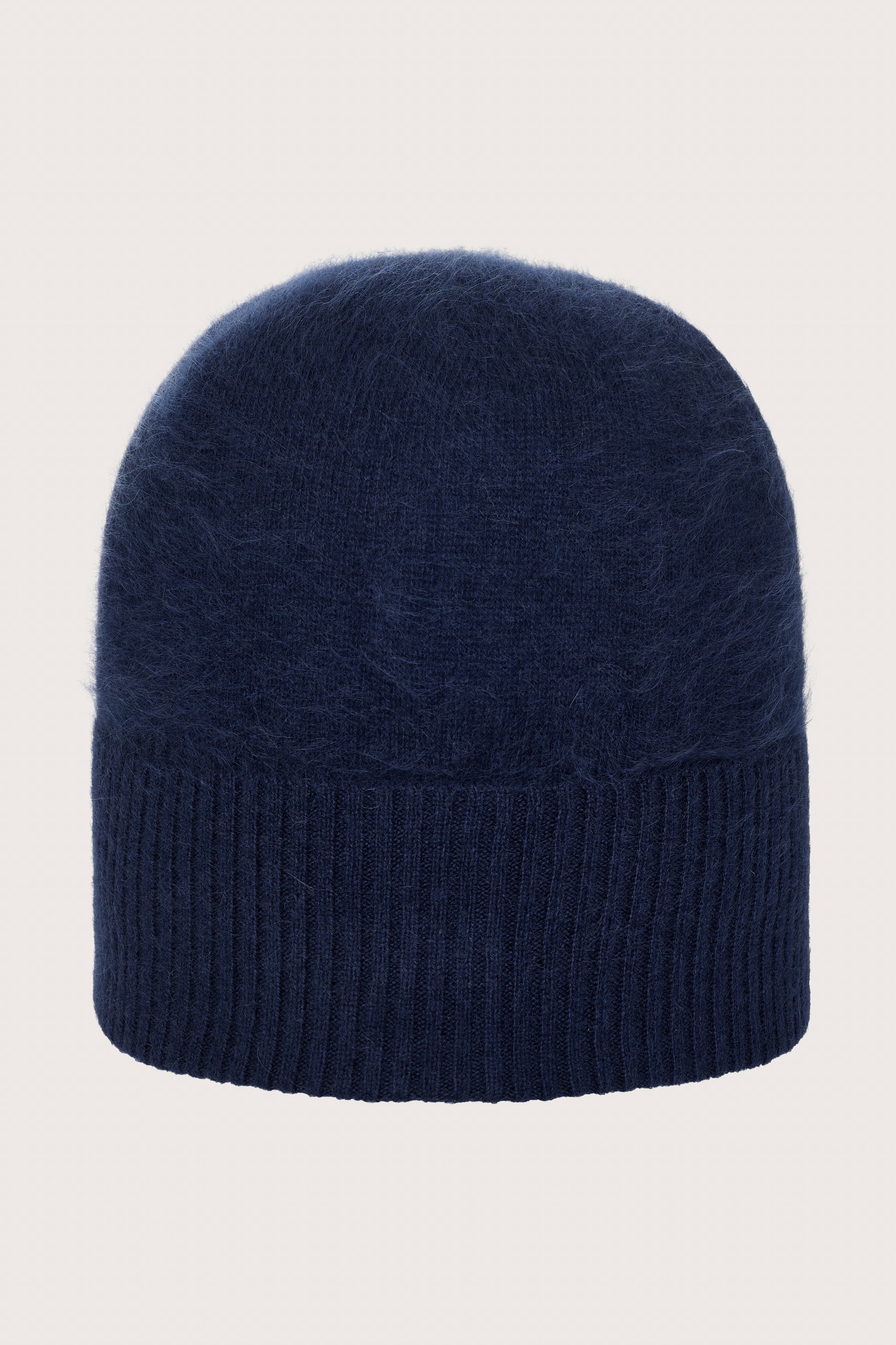 Navy cashmere blue knit beanie on a light gray background from Absolute Cashmere