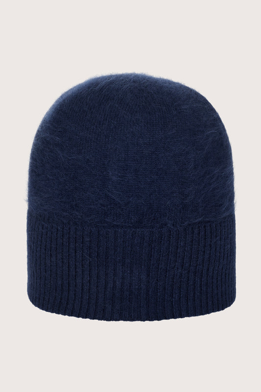 Navy cashmere blue knit beanie on a light gray background from Absolute Cashmere