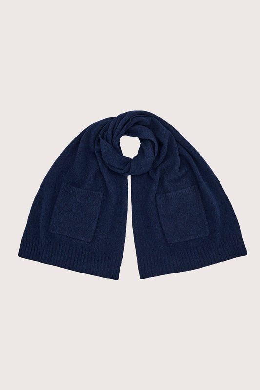 Navy blue cashmere scarf on a light gray background from absolute cashmere