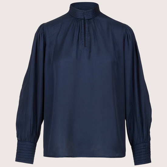 navy blouse with high neck with button closure with split neck from brdr