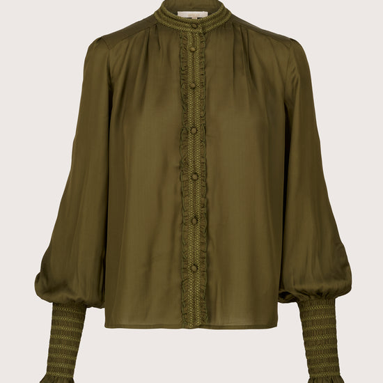 green round neck shirt with ruffle detailing and slim cuffs form brdr