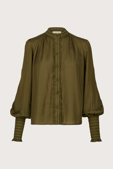 green round neck shirt with ruffle detailing and slim cuffs form brdr